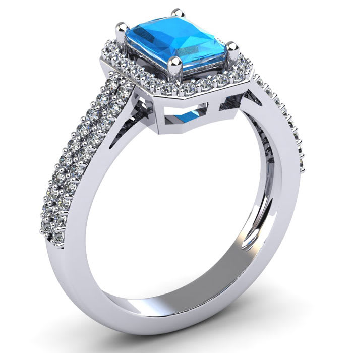 Blue Topaz Ring: 1 1/2 Carat Octagon Shape Blue Topaz and Halo Diamond Ring In Sterling Silver