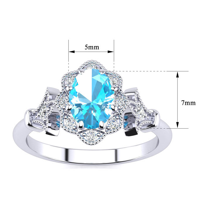 Blue Topaz Ring: 1 Carat Oval Shape Blue Topaz and Halo Diamond Ring In Sterling Silver