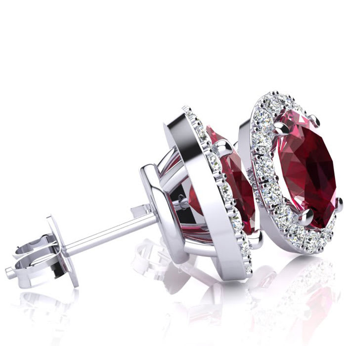 2 1/4 Carat Oval Shape Ruby and Halo Diamond Earrings In Sterling Silver