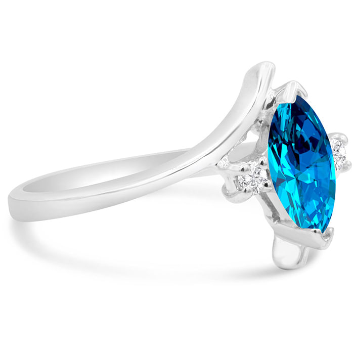 Blue Topaz Ring: 1/2 Carat Marquise Shape Blue Topaz and Diamond Ring In Sterling Silver