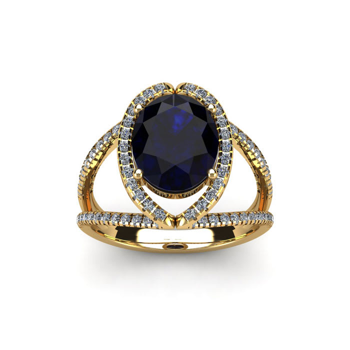 2 Carat Oval Shape Sapphire and Halo Diamond Ring In 14 Karat Yellow Gold