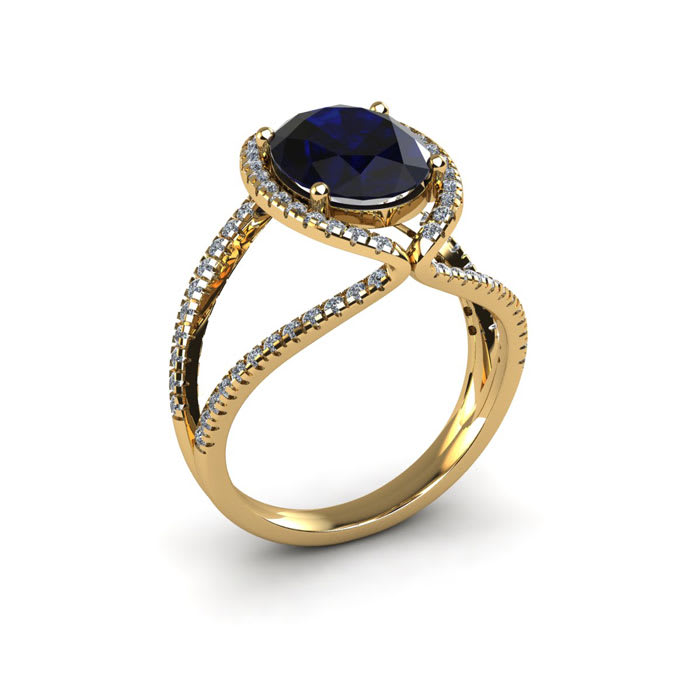 2 Carat Oval Shape Sapphire and Halo Diamond Ring In 14 Karat Yellow Gold