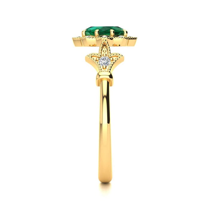 1 Carat Oval Shape Emerald and Halo Diamond Vintage Ring In 14 Karat Yellow Gold