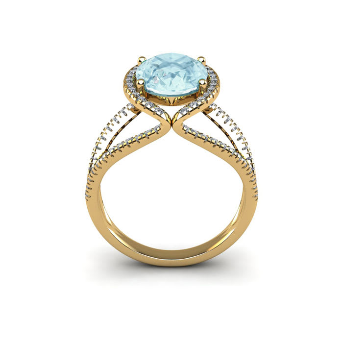 Aquamarine Ring: Aquamarine Jewelry: 1 1/2 Carat Oval Shape Aquamarine and Halo Diamond Ring In 14 Karat Yellow Gold
