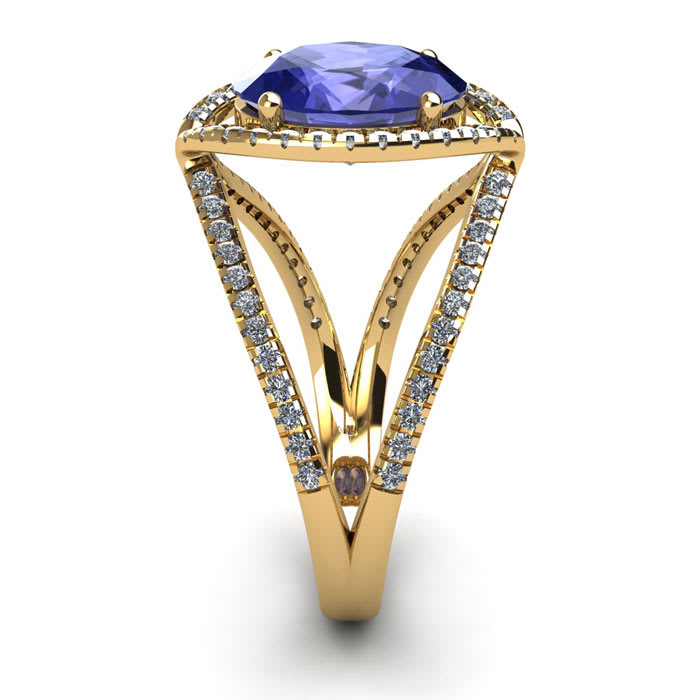 1 3/4 Carat Oval Shape Tanzanite and Halo Diamond Ring In 14 Karat Yellow Gold

