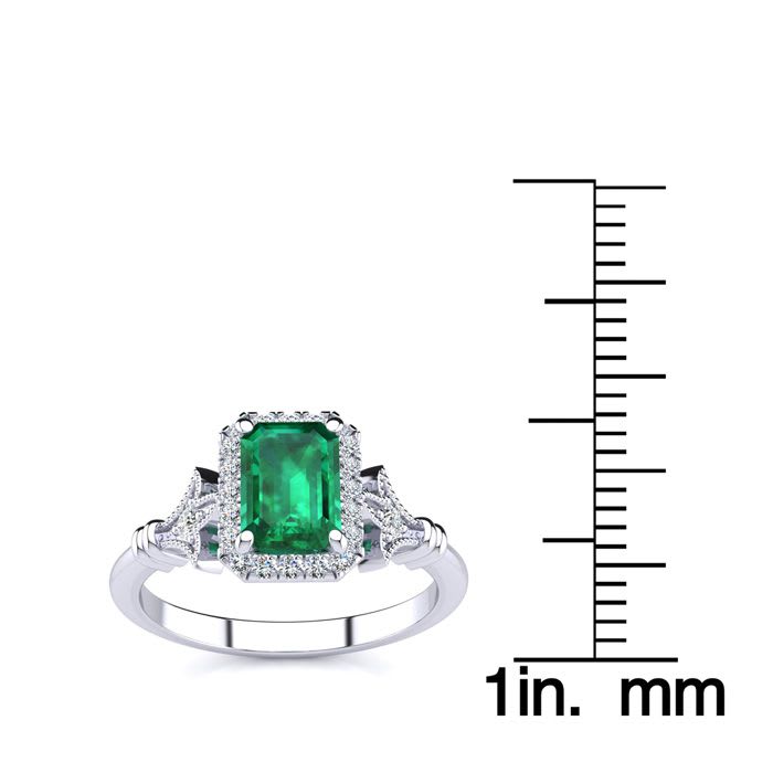 1 Carat Emerald and Halo Diamond Vintage Ring In 14 Karat White Gold