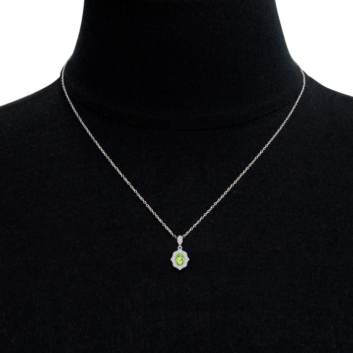 1 1/2 Carat Oval Shape Peridot and Diamond Necklace In 14 Karat White Gold, 18 Inches