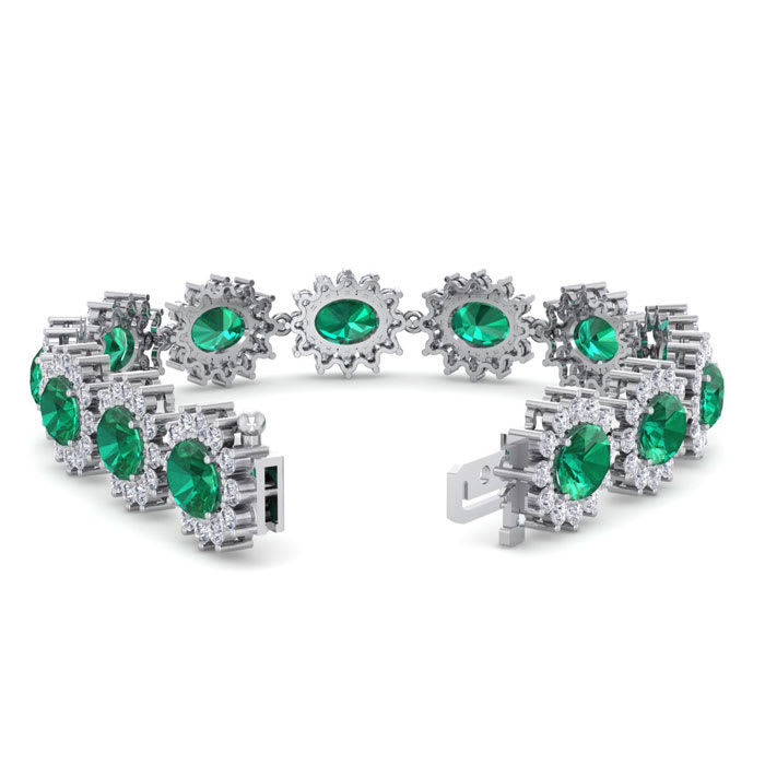 19 Carat Oval Shape Emerald and Halo Diamond Bracelet In 14 Karat White Gold, 7 Inches