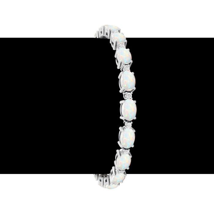 Opal Bracelet With 6 Carats of Oval Shape Opals and Diamonds In 14 Karat White Gold, 7 Inches