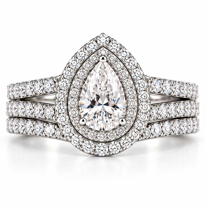 1 Carat Pear Shape Lab Grown Diamond Halo Bridal Set In Sterling Silver