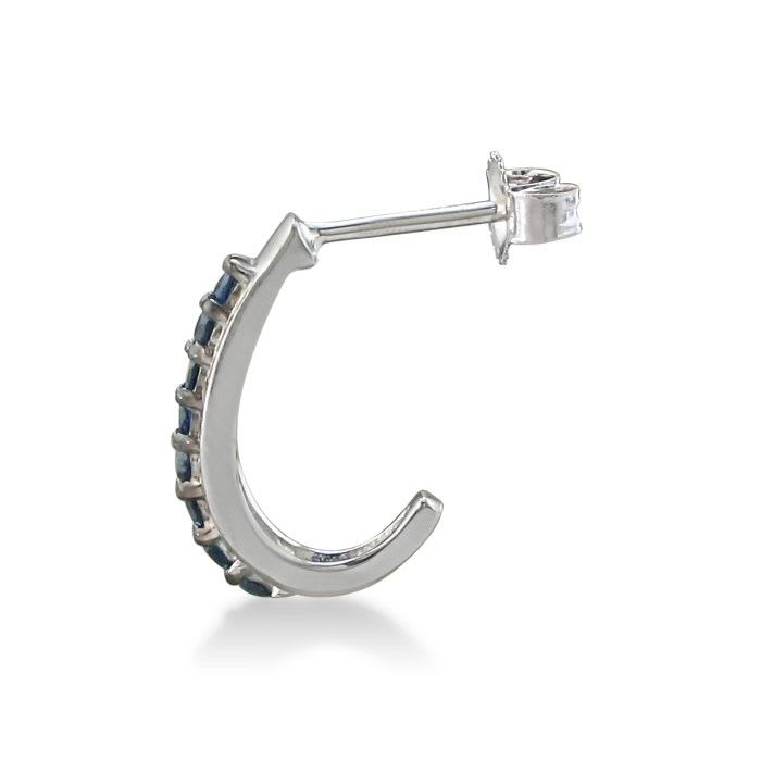 Sterling silver ruby J-hoop earrings. These everday earrings contain 16 midnight blue sapphires with a total gem weight of 1/3 carat.