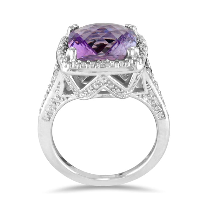 You will not believe this gorgeous  amethyst and diamond ring. Crafted in sterling silver and containing an appley green 4 carat total amethyst and diamonds.  The diamond content is .04 carat in J/K color and I2 clarity.  One Star diamonds.