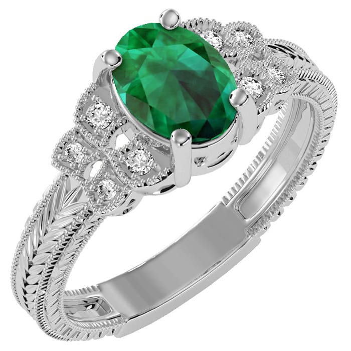 1 1/4 Carat Oval Shape Emerald and Diamond Ring In 10 Karat White Gold