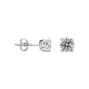 Nearly 3/4 Carat Natural Diamond Stud Earrings In Platinum