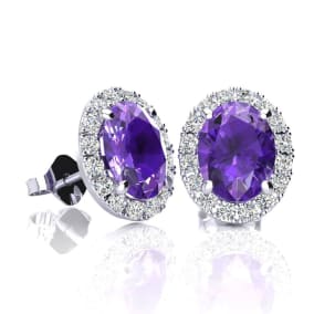1 1/2 Carat Oval Shape Amethyst and Halo Diamond Stud Earrings In 14 Karat White Gold