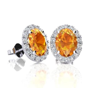 1 1/2 Carat Oval Shape Citrine and Halo Diamond Stud Earrings In 14 Karat White Gold