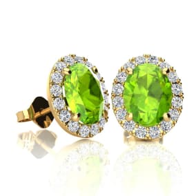 2 Carat Oval Shape Peridot and Halo Diamond Stud Earrings In 14 Karat Yellow Gold