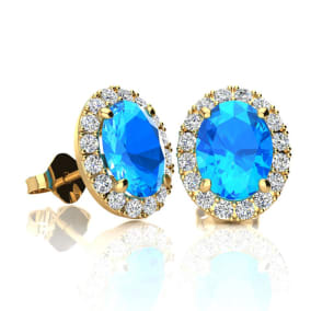 2 1/4 Carat Oval Shape Blue Topaz and Halo Diamond Stud Earrings In 14 Karat Yellow Gold