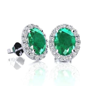 1 3/4 Carat Oval Shape Emerald and Halo Diamond Stud Earrings In 14 Karat White Gold