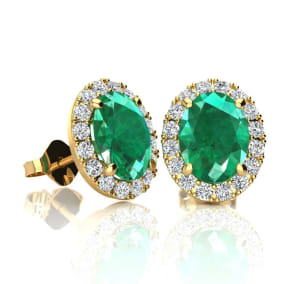 1 3/4 Carat Oval Shape Emerald and Halo Diamond Stud Earrings In 14 Karat Yellow Gold
