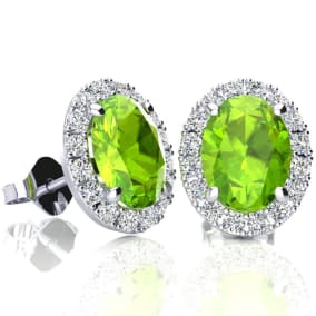 3 Carat Oval Shape Peridot and Halo Diamond Stud Earrings In 14 Karat White Gold