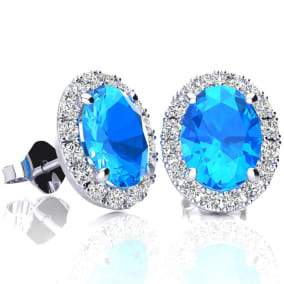 3 1/4 Carat Oval Shape Blue Topaz and Halo Diamond Stud Earrings In 14 Karat White Gold