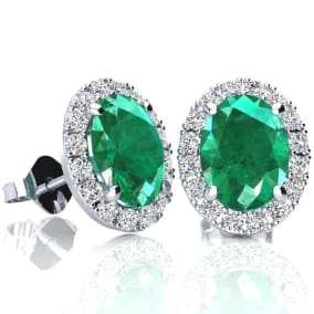 2 1/2 Carat Oval Shape Emerald and Halo Diamond Stud Earrings In 14 Karat White Gold