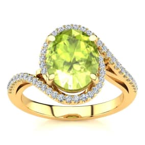 2 3/4 Carat Oval Shape Peridot and Halo Diamond Ring In 14 Karat Yellow Gold