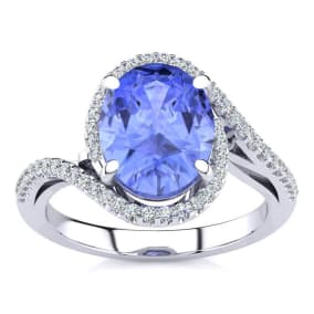 2 3/4 Carat Oval Shape Tanzanite and Halo Diamond Ring In 14 Karat White Gold