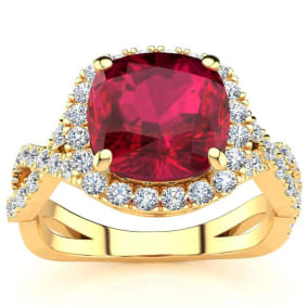 3 1/2 Carat Cushion Cut Ruby and Halo Diamond Ring With Fancy Band In 14 Karat Yellow Gold