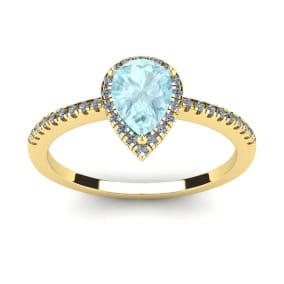 3/4 Carat Pear Shape Aquamarine and Halo Diamond Ring In 14 Karat Yellow Gold