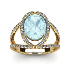 2 3/4 Carat Oval Shape Aquamarine and Halo Diamond Ring In 14 Karat Yellow Gold