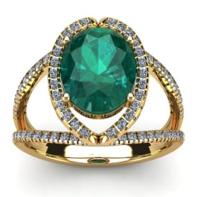 2 3/4 Carat Oval Shape Emerald and Halo Diamond Ring In 14 Karat Yellow Gold