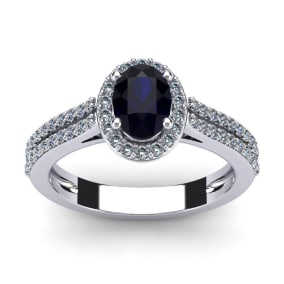 1 1/2 Carat Oval Shape Sapphire and Halo Diamond Ring In 14 Karat White Gold