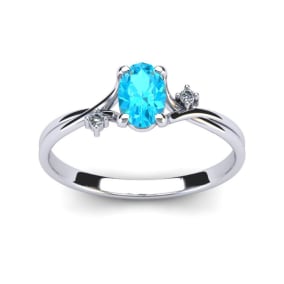 1/2 Carat Oval Shape Aquamarine and Two Diamond Accent Ring In 14 Karat White Gold