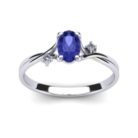 1/2 Carat Oval Shape Tanzanite and Two Diamond Accent Ring In 14 Karat White Gold
