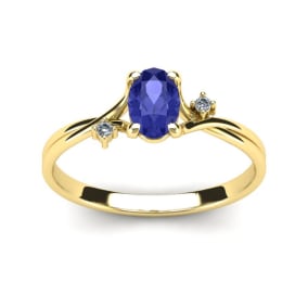 1/2 Carat Oval Shape Tanzanite and Two Diamond Accent Ring In 14 Karat Yellow Gold