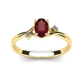 1/2 Carat Oval Shape Garnet and Two Diamond Accent Ring In 14 Karat Yellow Gold