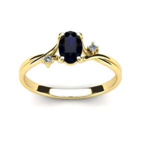 1/2 Carat Oval Shape Sapphire and Two Diamond Accent Ring In 14 Karat Yellow Gold
