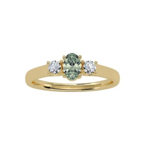 1/2 Carat Oval Shape Green Amethyst and Two Diamond Ring In 14 Karat Yellow Gold