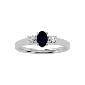 3/4 Carat Oval Shape Sapphire and Two Diamond Ring In 14 Karat White Gold
