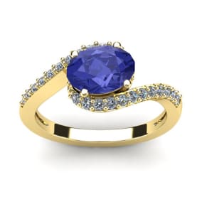 1 1/2 Carat Oval Shape Tanzanite and Halo Diamond Ring In 14 Karat Yellow Gold