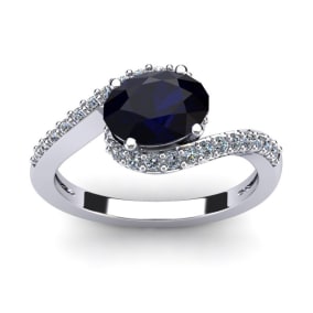 1 3/4 Carat Oval Shape Sapphire and Halo Diamond Ring In 14 Karat White Gold
