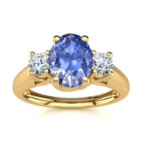 1.15 Carat Oval Shape Tanzanite and Two Diamond Ring In 14 Karat Yellow Gold