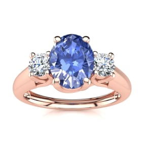 1.15 Carat Oval Shape Tanzanite and Two Diamond Ring In 14 Karat Rose Gold
