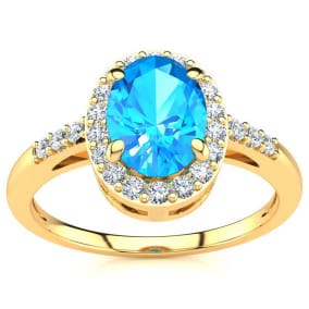 1 Carat Oval Shape Blue Topaz and Halo Diamond Ring In 14K Yellow Gold