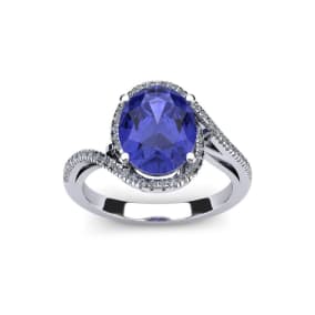 1 1/4 Carat Oval Shape Tanzanite and Halo Diamond Ring In 14 Karat White Gold