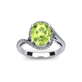 1 1/2 Carat Oval Shape Peridot and Halo Diamond Ring In 14 Karat White Gold