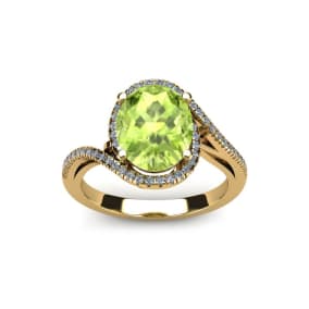 1 1/2 Carat Oval Shape Peridot and Halo Diamond Ring In 14 Karat Yellow Gold