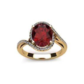 1 3/4 Carat Oval Shape Garnet and Halo Diamond Ring In 14 Karat Yellow Gold
